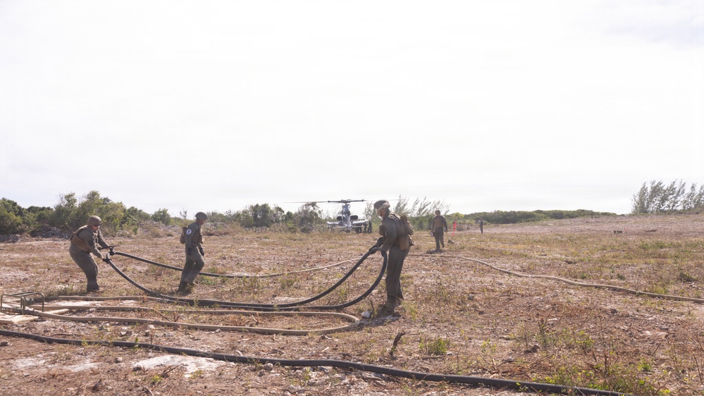 U.S. Marines with MWSS-271 refuel AH-1Z vipers with HMLA-269