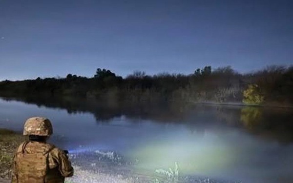 U.S. Army Soldier Monitors the Rio Grande at Night