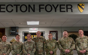 1st Cavalry Division Best Drone Warfighter competitors receive coins from Chief of Staff of the Army