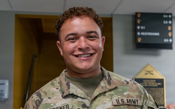 1st Cavalry Division Best Drone Warfighter competitors receive coins from Chief of Staff of the Army