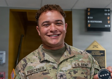 1st Cavalry Division Best Drone Warfighter competitors receive coins from Chief of Staff of the Army