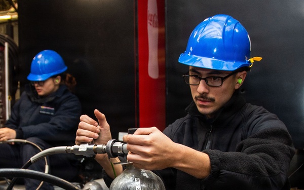 Ronald Reagan Sailors and Shipyard Workers Conduct Maintenance