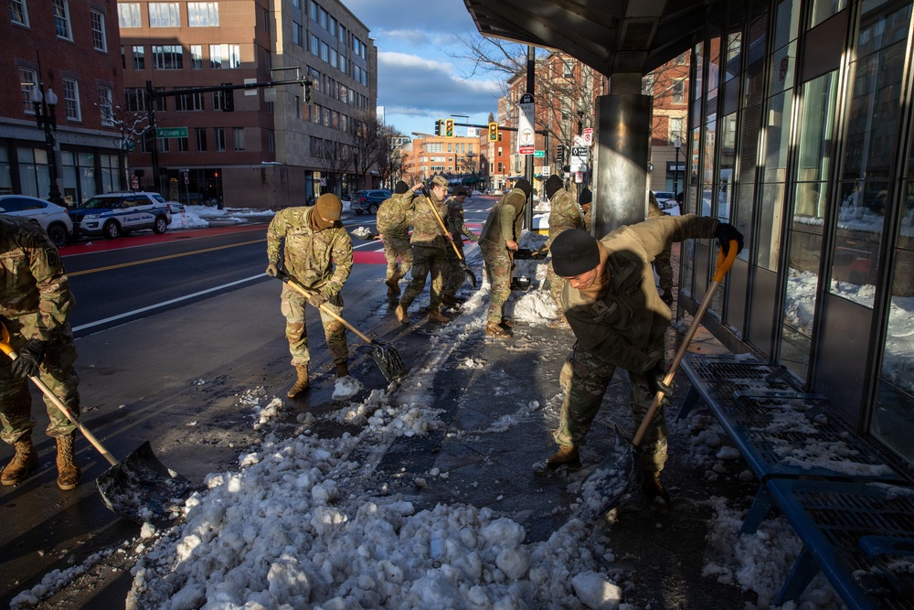 Mass Guardsmen Dig Out Boston Bus Stops