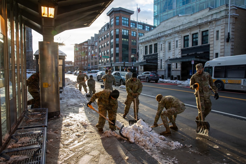 Mass Guardsmen Dig Out Boston Bus Stops
