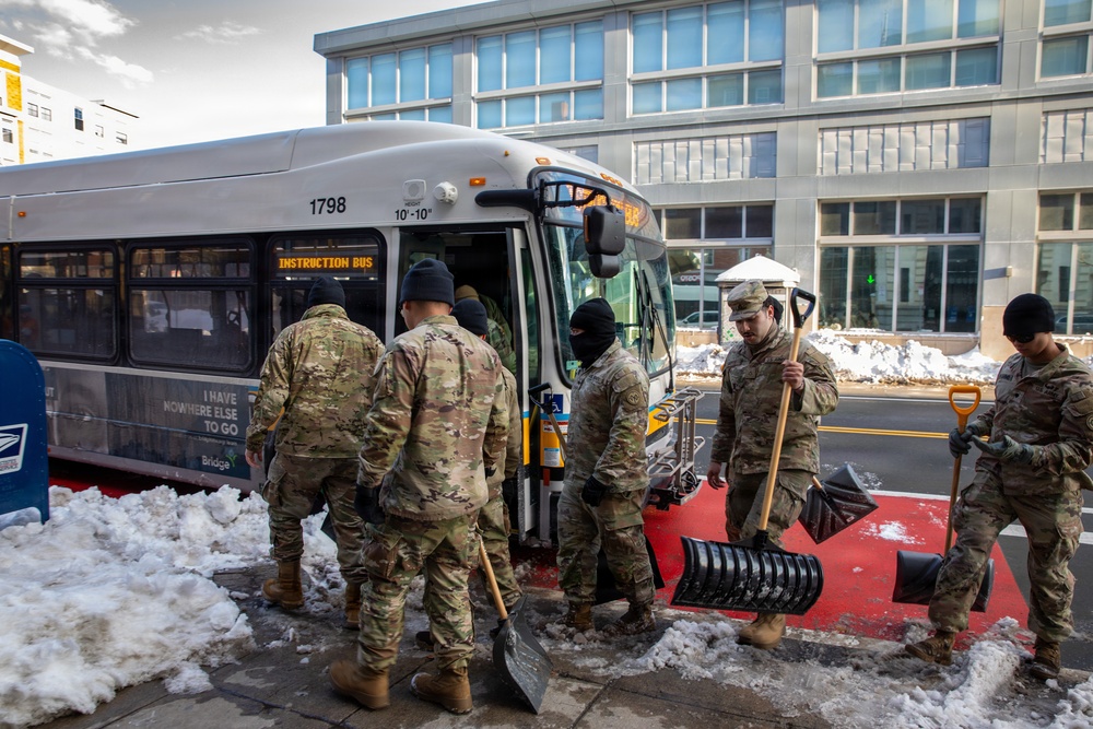Mass Guardsmen Dig Out Boston Bus Stops