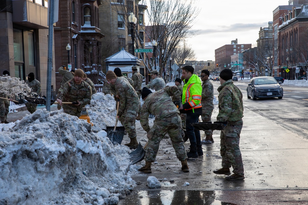 Mass Guardsmen Dig Out Boston Bus Stops