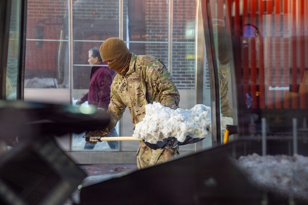 Mass Guardsmen Dig Out Boston Bus Stops