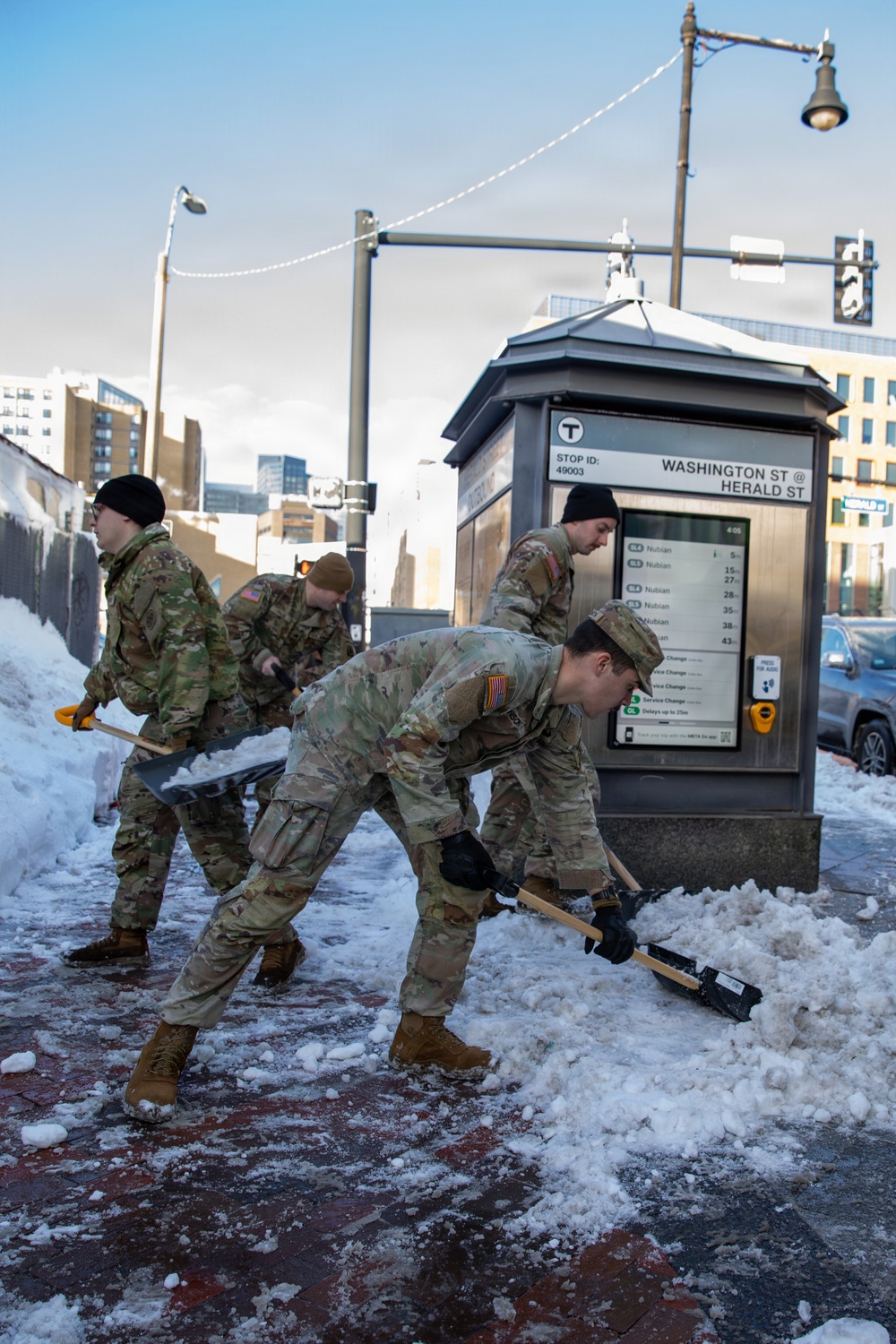 Mass Guardsmen Dig Out Boston Bus Stops
