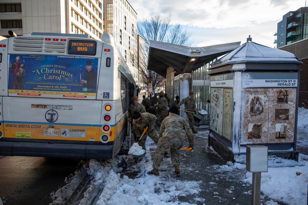 Mass Guardsmen Dig Out Boston Bus Stops