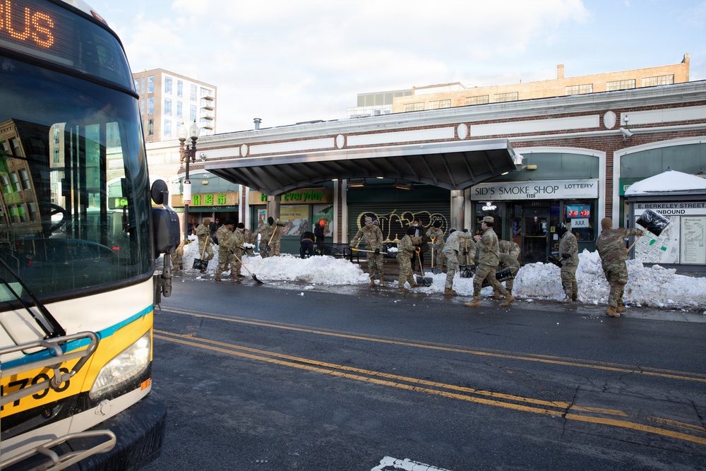 Mass Guardsmen Dig Out Boston Bus Stops