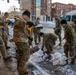Mass Guardsmen Dig Out Boston Bus Stops