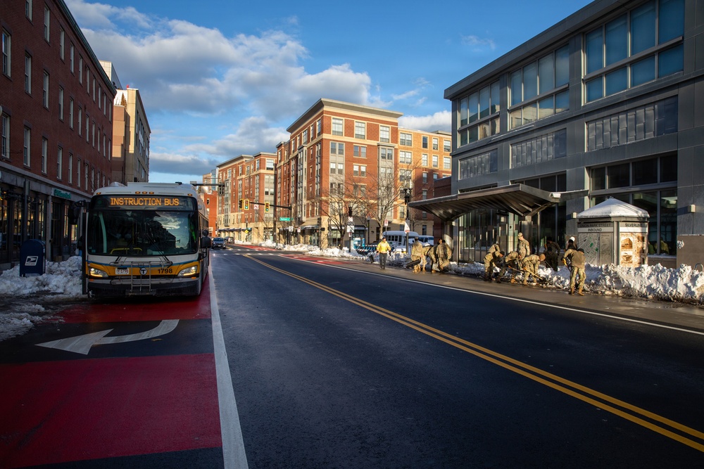 Mass Guardsmen Dig Out Boston Bus Stops