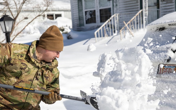 Mass Guardmen Assist Elderly Residents of Kingston