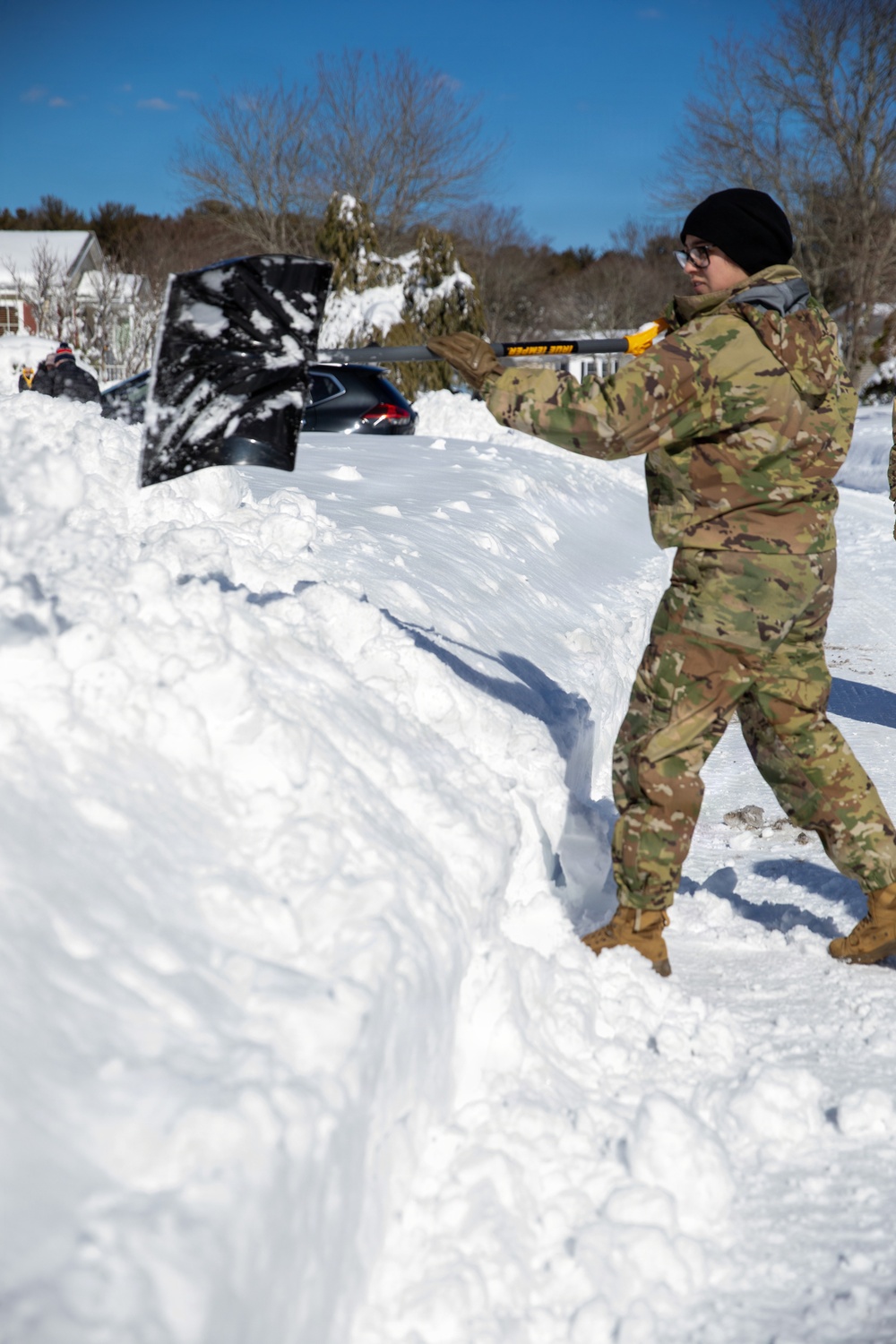 Mass Guardmen Assist Elderly Residents of Kingston