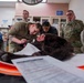 Joint Force medical experimentation team performs mass casualty drill USCG Air Station Kodiak during ARCTIC EDGE 2026