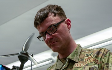 Airman Inspects Drone