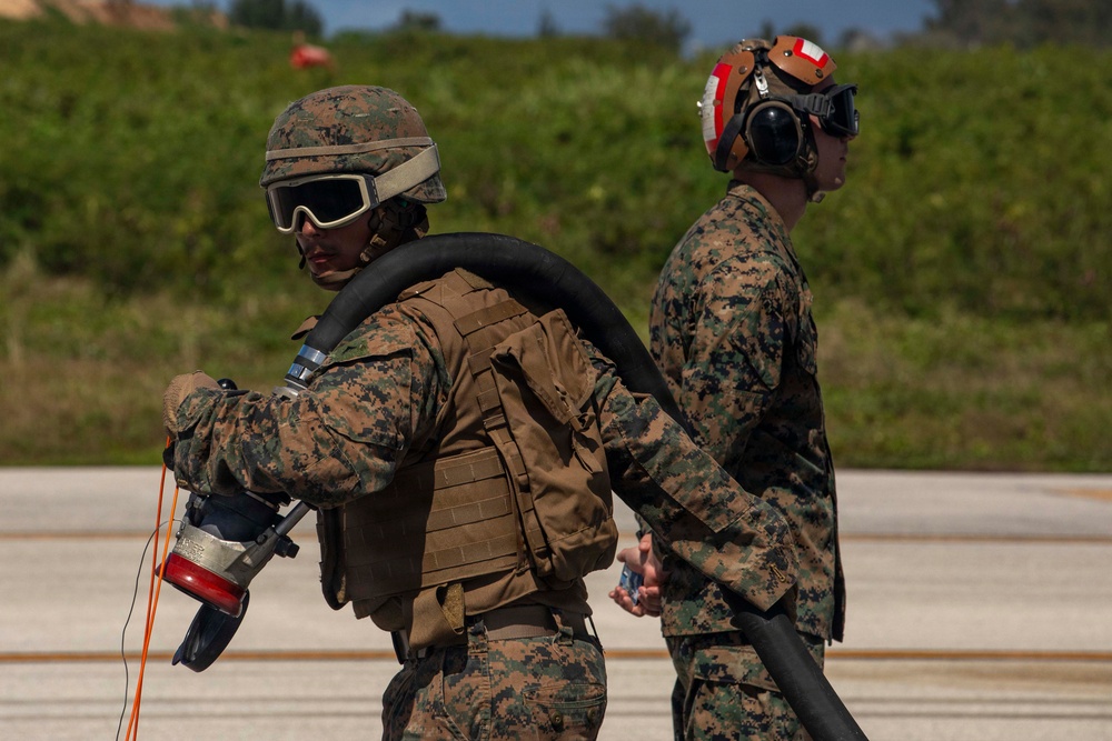 U.S. Marines hot refuel F/A-18 Hornets during Tinian FARP operations