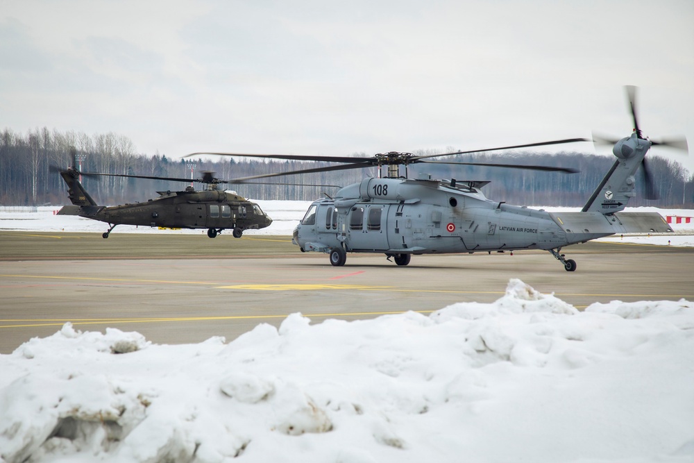 3rd Combat Aviation Brigade and Latvian Airforce conduct Latvia's first multinational UH-60 multi-ship flight