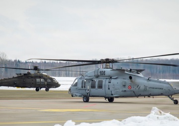 3rd Combat Aviation Brigade Bolsters V Corps’ Interoperability with Latvia’s Inaugural Multinational UH-60 Black Hawk Multi-Ship Flight