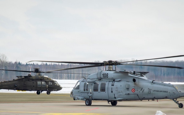 3rd Combat Aviation Brigade and Latvian Airforce conduct Latvia's first multinational UH-60 multi-ship flight