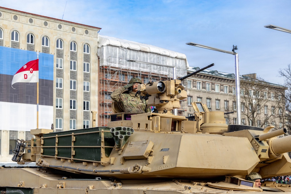 U.S. Soldiers Salutes On Top of a M1A2 Abrams During Estonian Independence Day Parade
