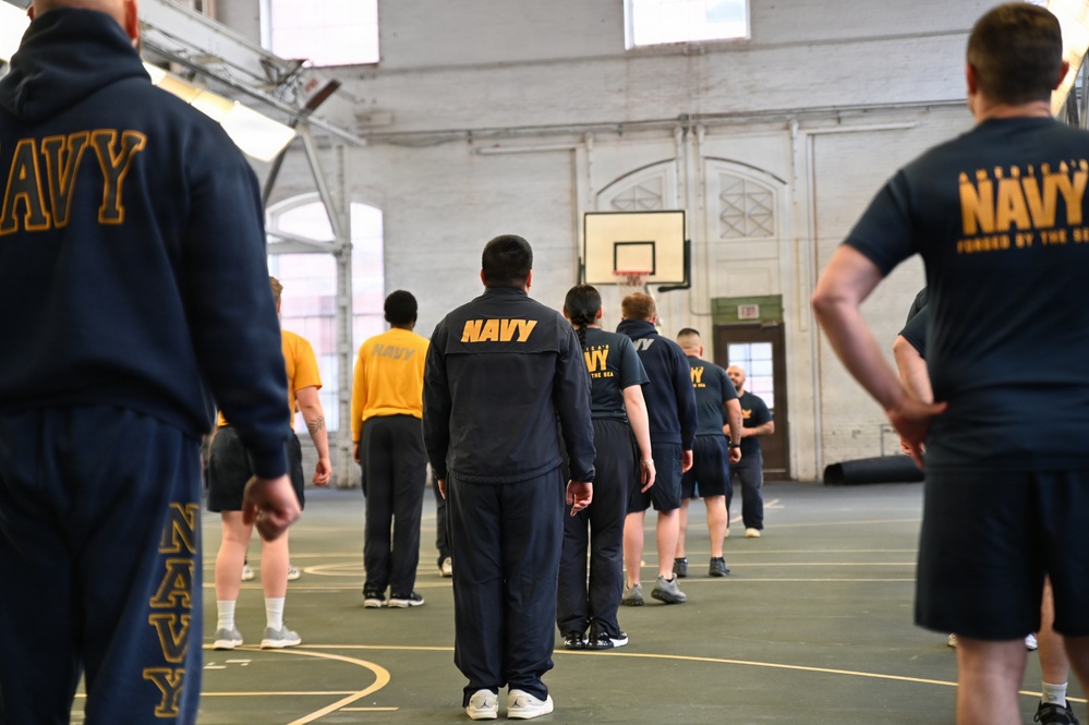 NSAW Sailors stand in formation for group fitness