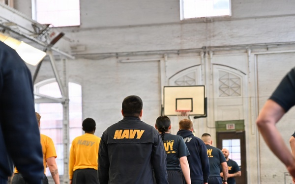 NSAW Sailors stand in formation for group fitness