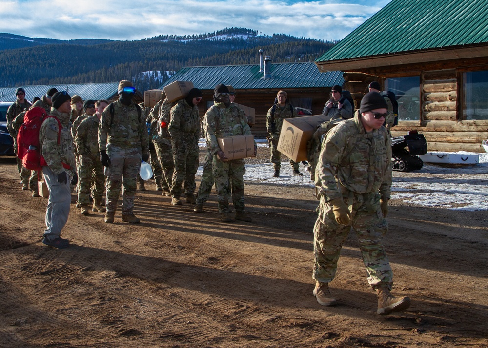 10th Special Forces Group (Airborne) Soldiers participate in a ruck during Cold Weather Training.