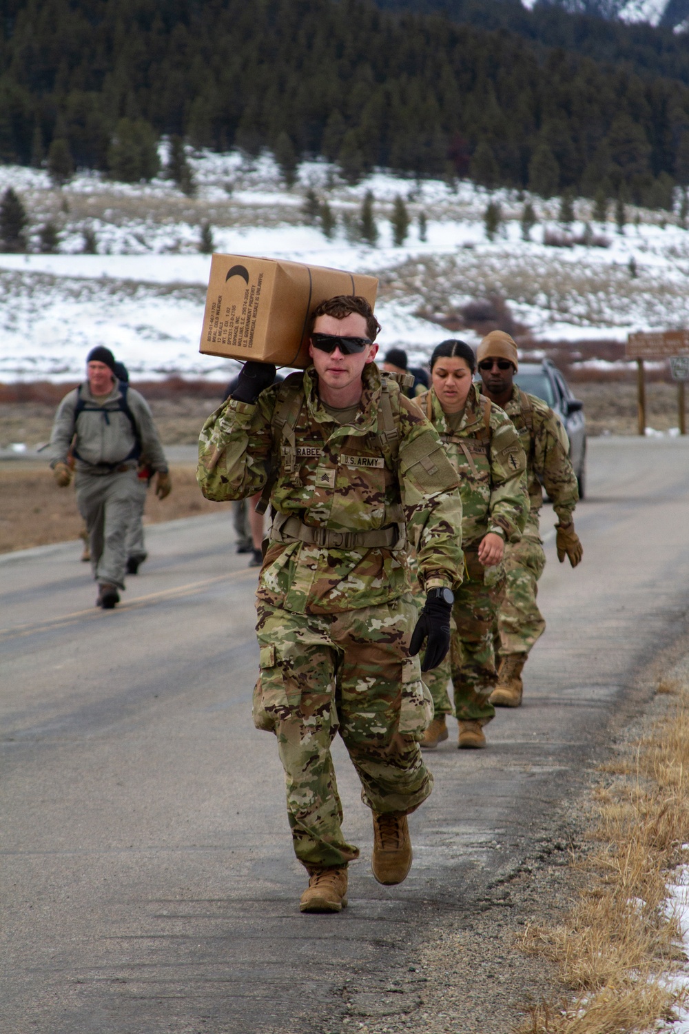 10th Special Forces Group (Airborne) Soldiers participate in a ruck during Cold Weather Training.