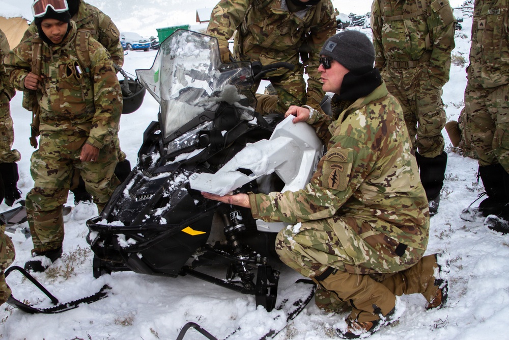 10th Special Forces Group (Airborne) Soldiers Train In Snowmobile Operation During Cold Weather Training.