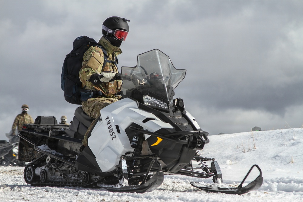 10th Special Forces Group (Airborne) Soldiers Train In Snowmobile Operation During Cold Weather Training.