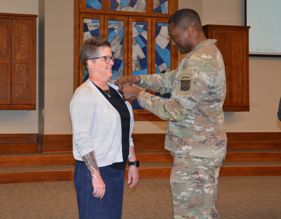 Doctrine editor receives 10-year service pin