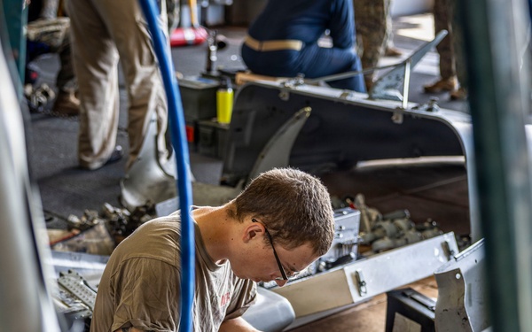 USS Iwo Jima Sailors Conduct MH-60S Seahawk Maintenance