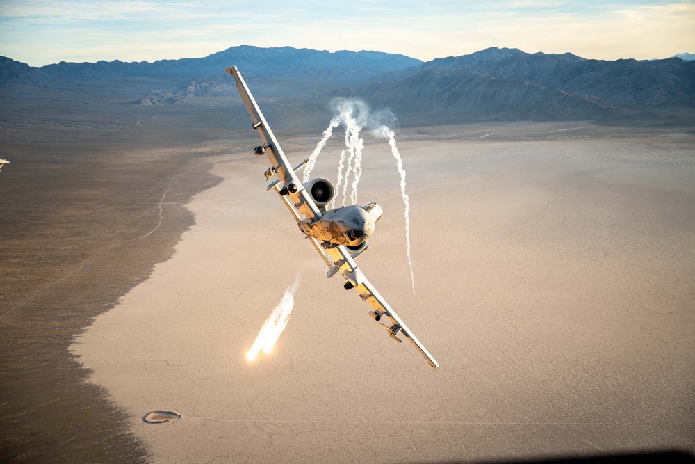 Flares Illuminate Sky During A-10 Maneuver