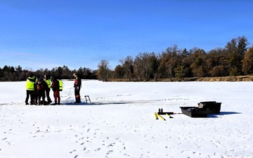 Fort McCoy DES Fire Department dive team holds February rescue training under ice