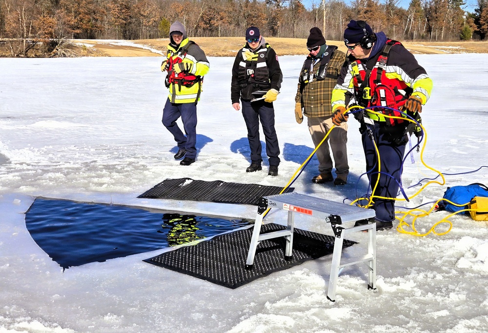 Fort McCoy DES Fire Department dive team holds February rescue training under ice