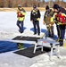 Fort McCoy DES Fire Department dive team holds February rescue training under ice