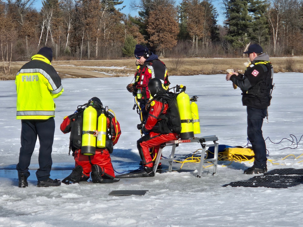 Fort McCoy DES Fire Department dive team holds February rescue training under ice