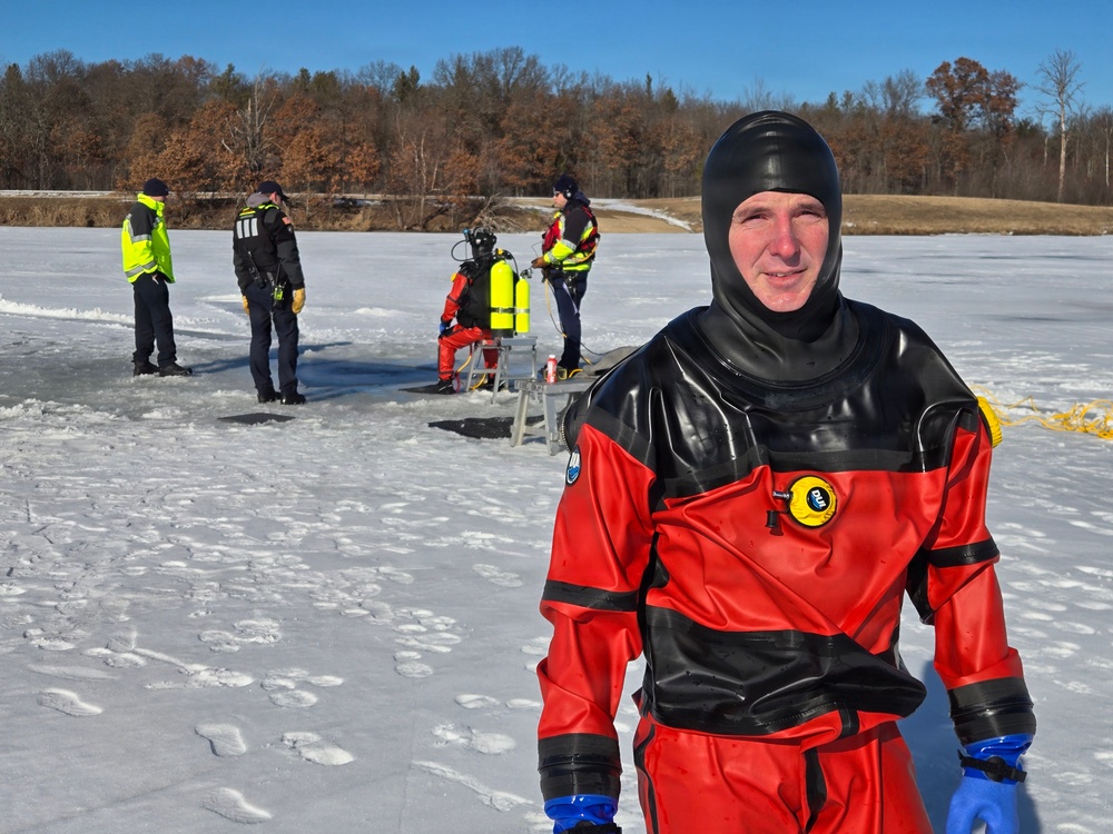 Fort McCoy DES Fire Department dive team holds February rescue training under ice