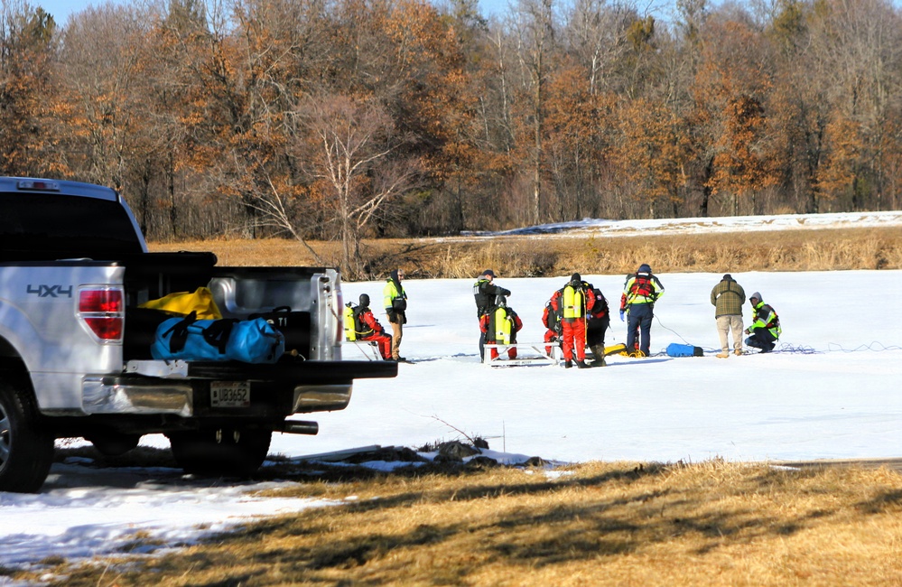 Fort McCoy DES Fire Department dive team holds February rescue training under ice