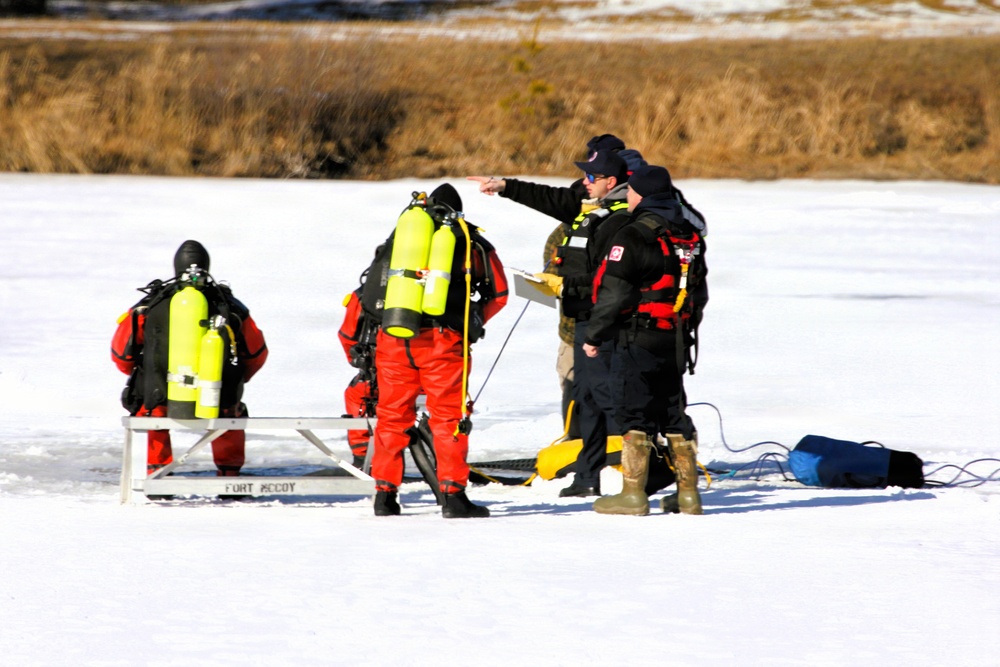 Fort McCoy DES Fire Department dive team holds February rescue training under ice