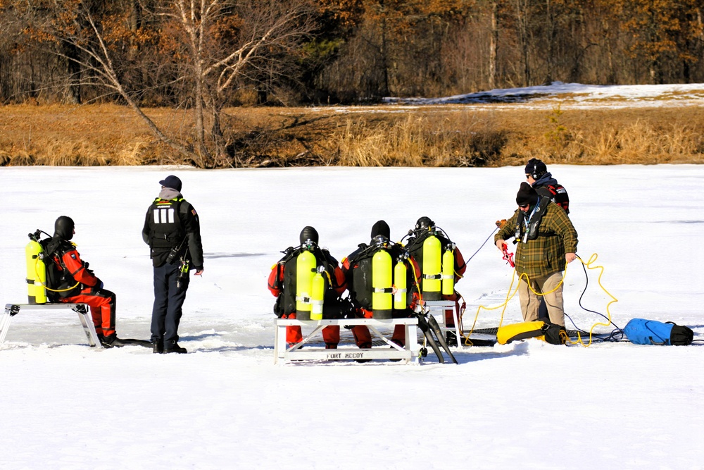 Fort McCoy DES Fire Department dive team holds February rescue training under ice