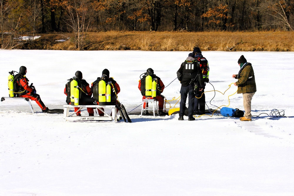 Fort McCoy DES Fire Department dive team holds February rescue training under ice