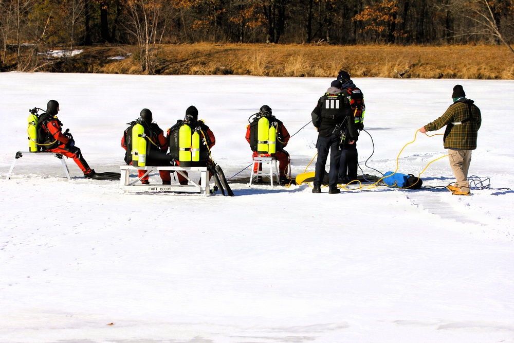 Fort McCoy DES Fire Department dive team holds February rescue training under ice