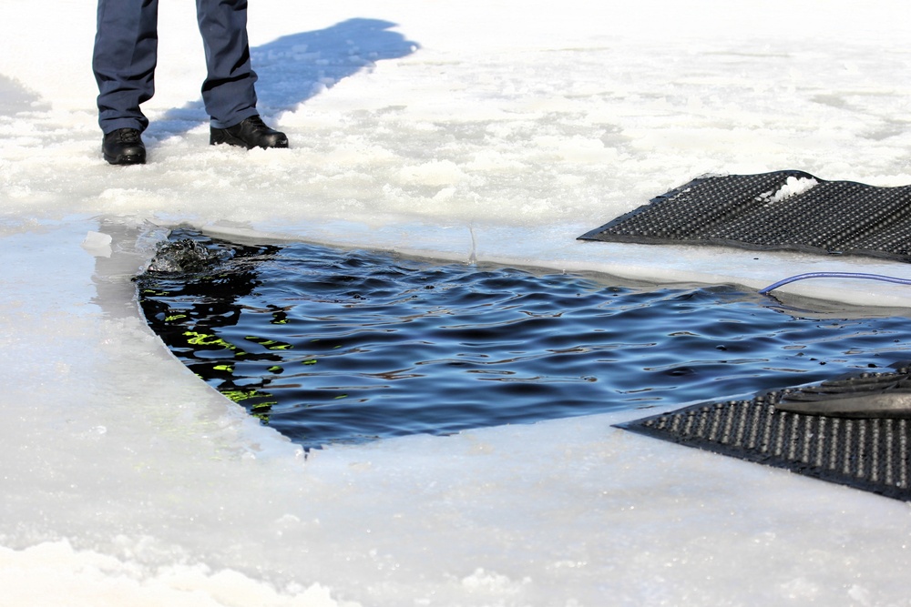 Fort McCoy DES Fire Department dive team holds February rescue training under ice