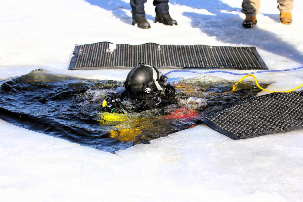 Fort McCoy DES Fire Department dive team holds February rescue training under ice