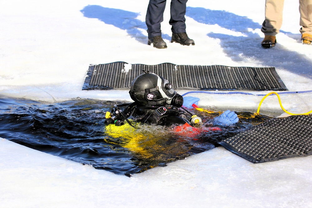 Fort McCoy DES Fire Department dive team holds February rescue training under ice