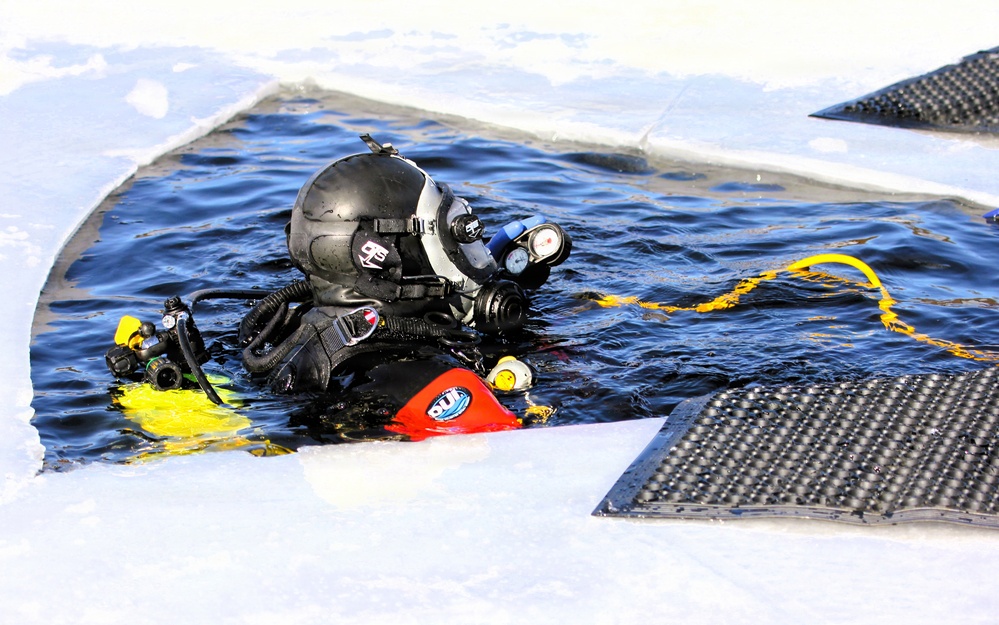 Fort McCoy DES Fire Department dive team holds February rescue training under ice