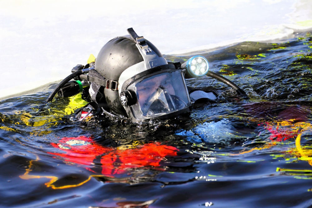 Fort McCoy DES Fire Department dive team holds February rescue training under ice