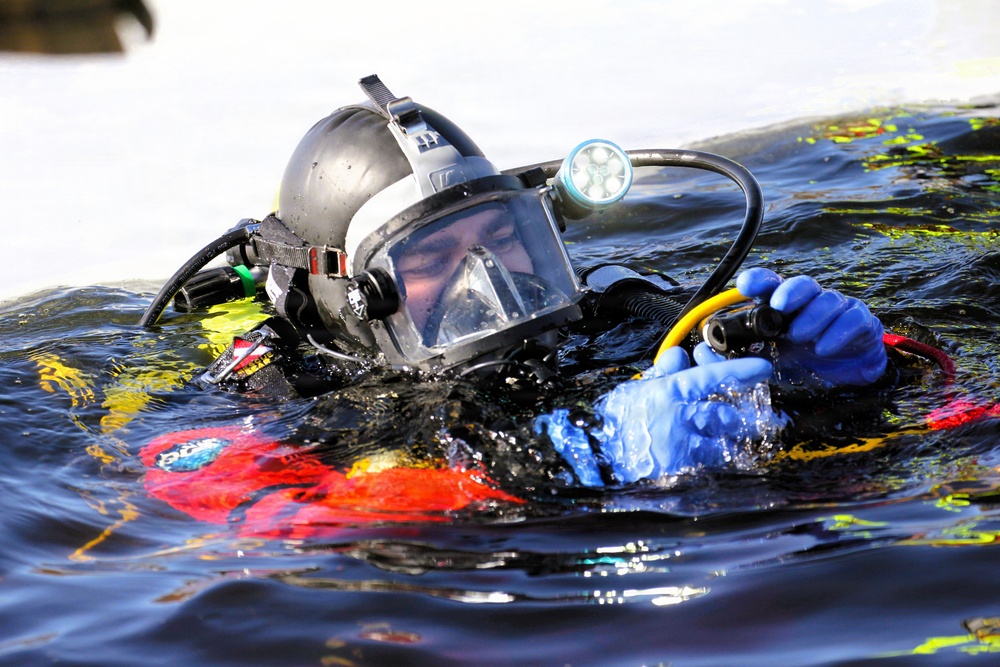Fort McCoy DES Fire Department dive team holds February rescue training under ice